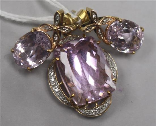 A 9ct gold, kunzite and diamond suite of jewellery comprising a pendant and pair of earrings.